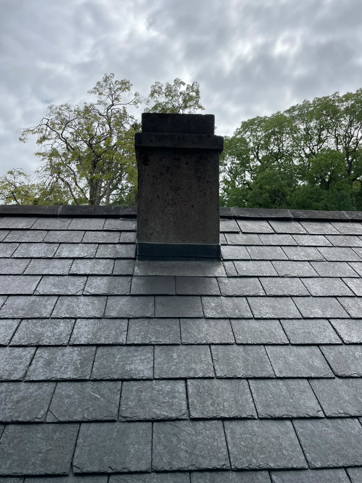 Chimney flashing on slate roof by Stonevale Construction