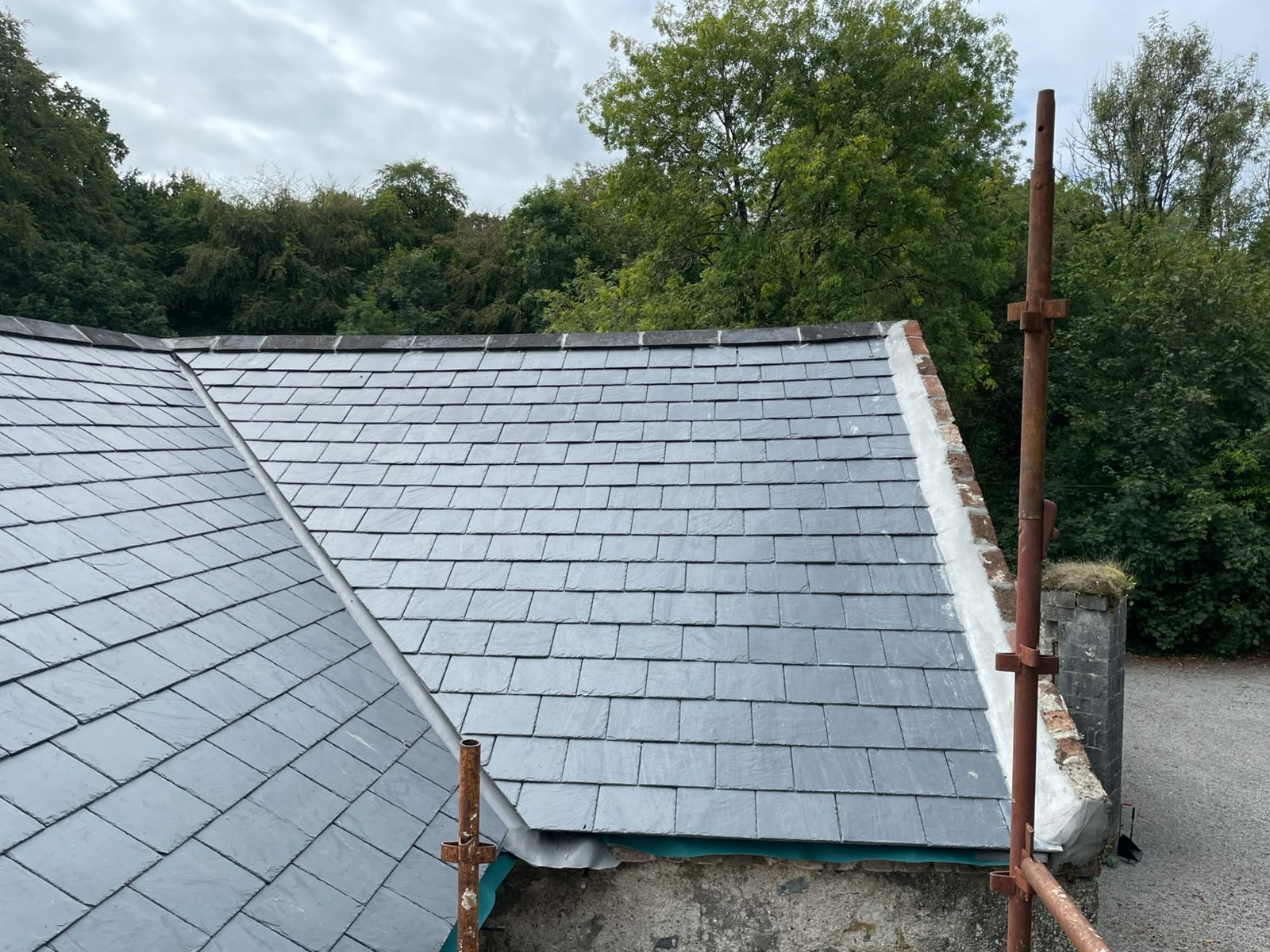 Slate roof span with scaffold access by Stonevale Construction